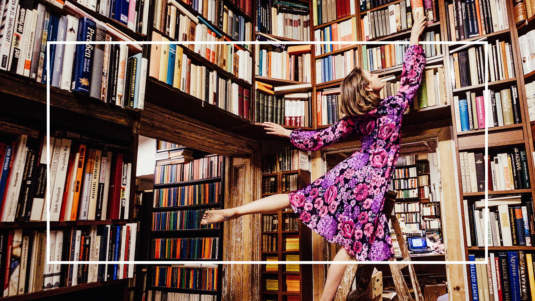 Photo of woman browsing bookshelves