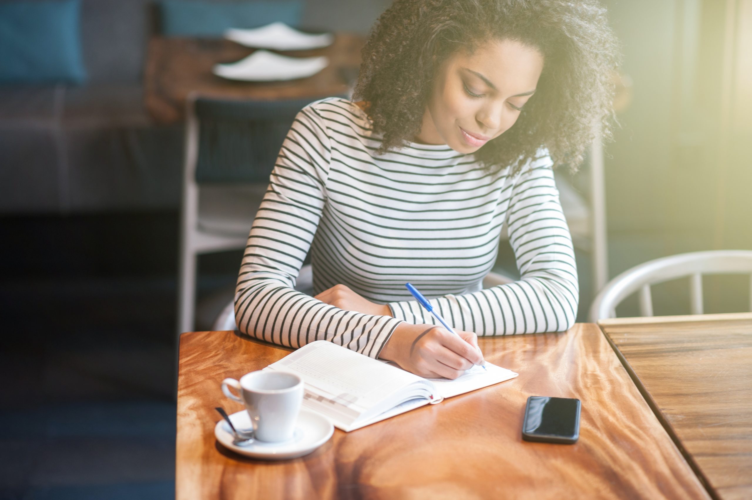 Photo of woman writing